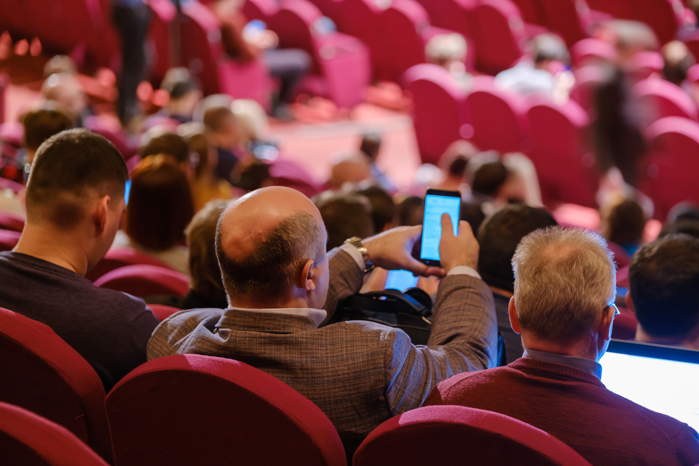 man using custom event mobile app